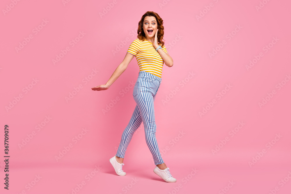 Full length body size view of her she nice-looking attractive lovely charming amazed overjoyed cheerful cheery wavy-haired girl strolling good mood isolated over pink pastel color background Full length body size view of her she nice-looking attractive lovely charming amazed overjoyed cheerful cheery wavy-haired girl strolling good mood isolated over pink pastel color background