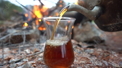 The most delicious tea made on the fire In mountains photo