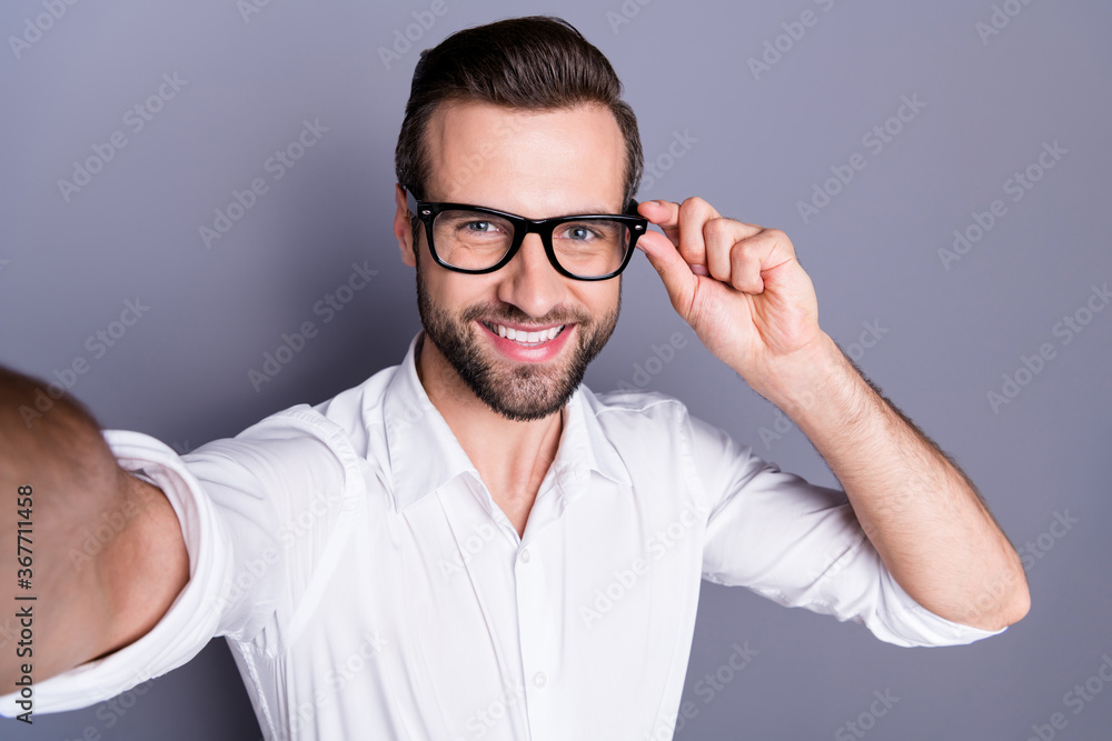 Self-portrait of his he nice attractive cheerful cheery content neat brunet guy corporate manager consultant employee touching specs isolated over gray pastel color background Self-portrait of his he nice attractive cheerful cheery content neat brunet guy corporate manager consultant employee touching specs isolated over gray pastel color background