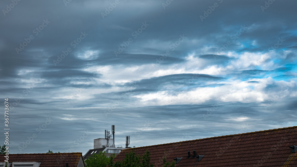 Fototapeta premium Wave clouds or lenticular clouds in the sky