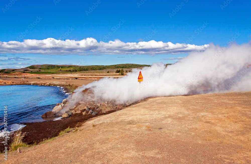 Hot steam and a blue lagoon near Myvatn, Iceland Hot steam and a blue lagoon near Myvatn, Iceland
