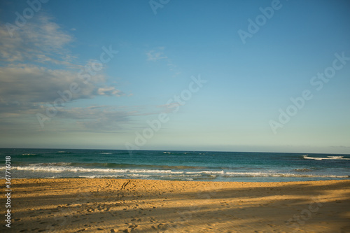 sandy beach without tourists. vacation by ocean.