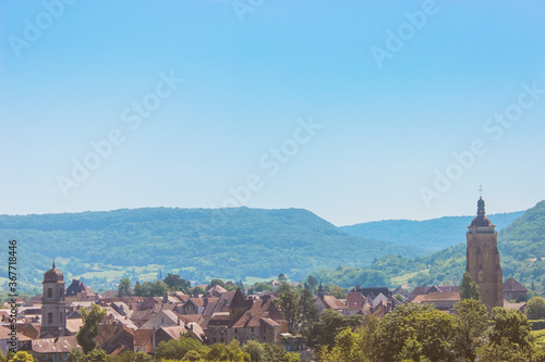 panorama of the old town. summer landscape with road and mountains