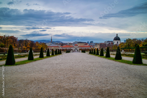 The main walking alley before Unteres Belvedere in Vienna on a background of cloudy sky.