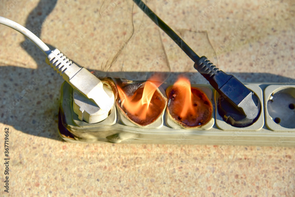 Outlets with switche caught fire in room. Overloaded electrical current