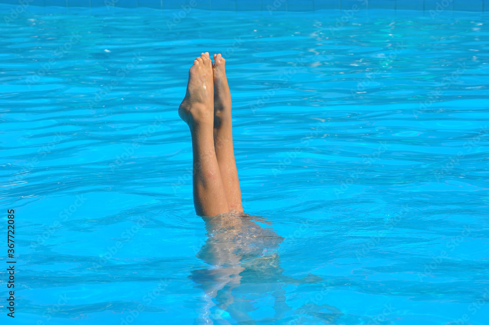 girl syncronized swimming