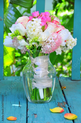 Vase with beautiful  flowers on table

A photo