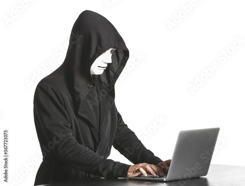 Professional hacker using l...