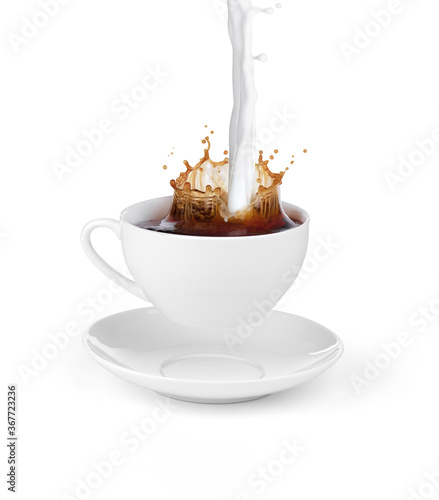 splash of coffee with milk in a cup