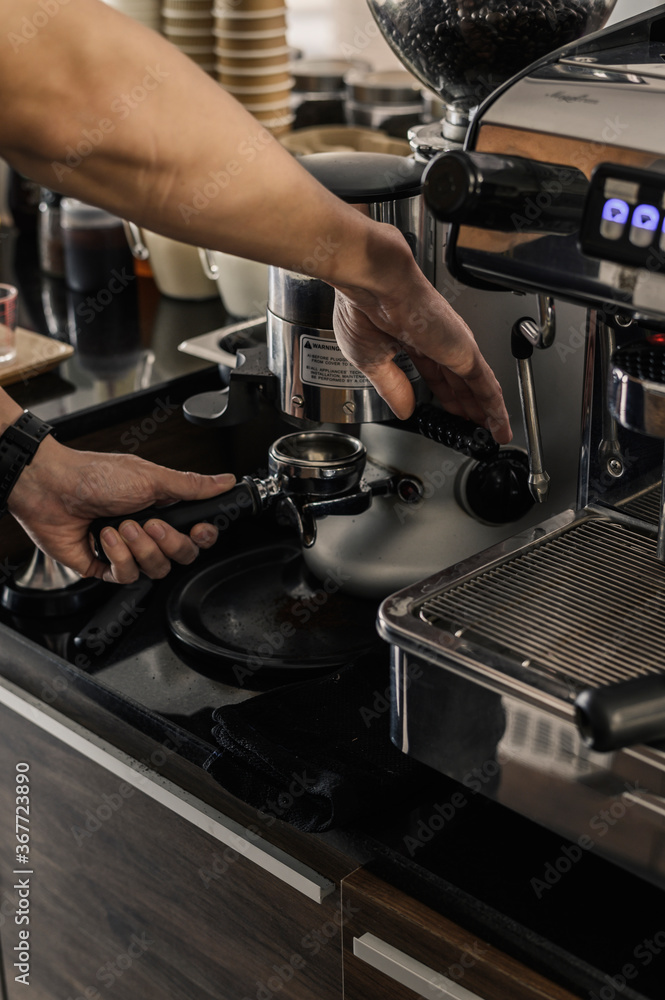 using of coffee machine at the cafe. close up image using of coffee machine at the cafe. close up image
