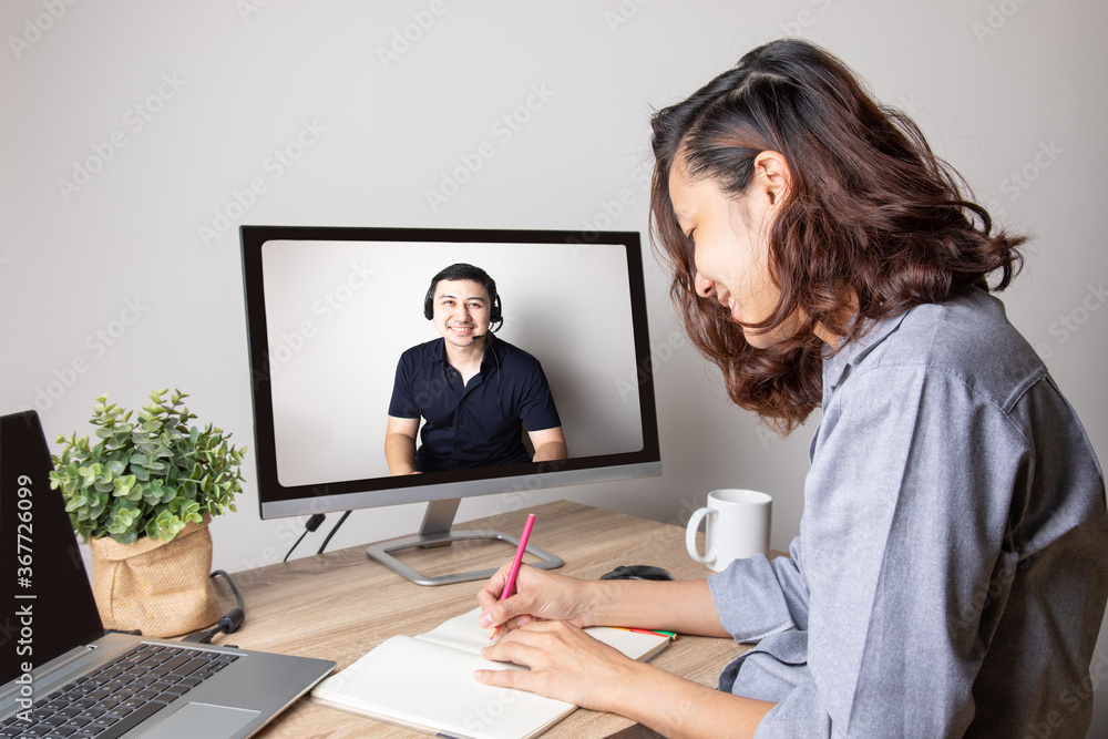 Concept photo of telemeeting conference for business woman talking with client or team showing computer screen which is lifestyle working in digital communication for global networking from anywhere Concept photo of telemeeting conference for business woman talking with client or team showing computer screen which is lifestyle working in digital communication for global networking from anywhere