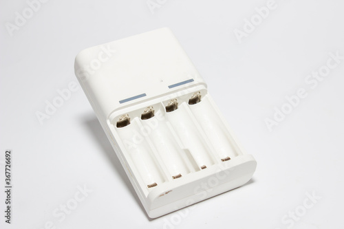 Universal battery charger. White background