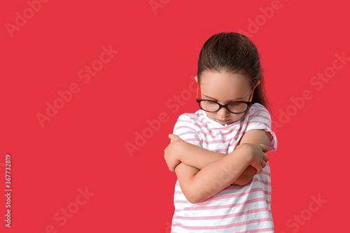 Sad little girl with autist...