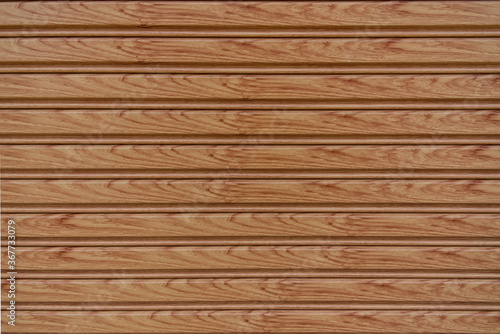Wood desk plank to use as background or texture.