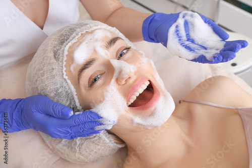 Woman undergoing procedure ...