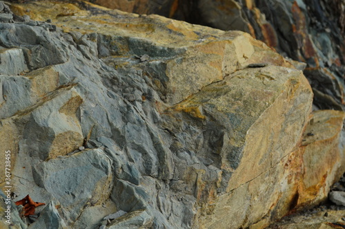 Rock layers - a colorful formations of rocks stacked over the hundreds of years. Interesting background with fascinating texture.