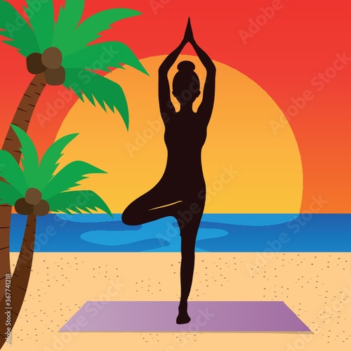 woman practicing yoga in tree pose