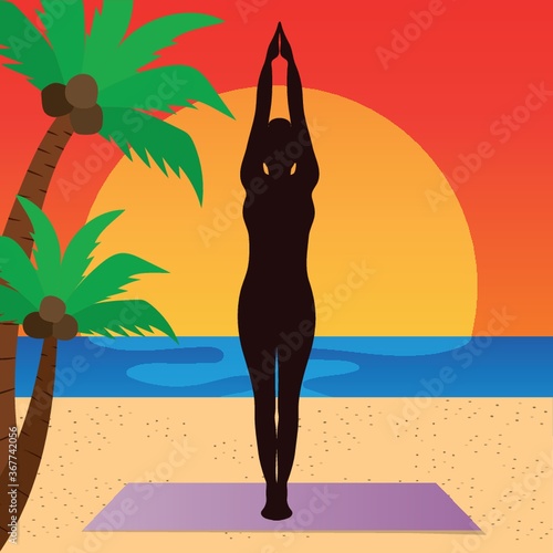 woman practicing yoga in palm tree pose