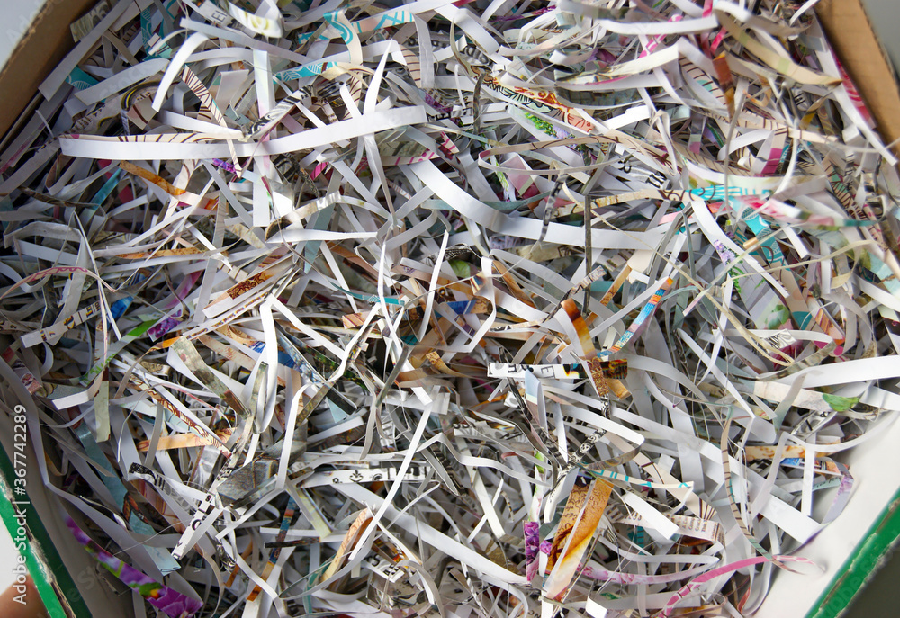 CloseUp shredded paper texture and reuse paper scrap background. CloseUp shredded paper texture and reuse paper scrap background.