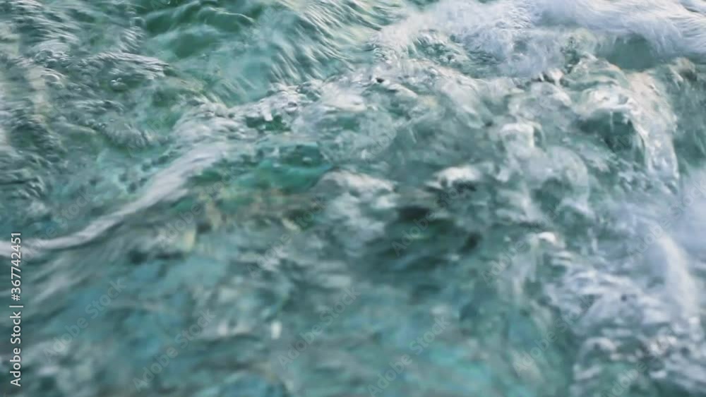 bubbling streams of clear blue water pressure over cyan aqua bubbling streams of clear blue water pressure over cyan aqua