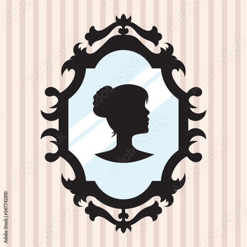 silhouette of a girl in mirror frame