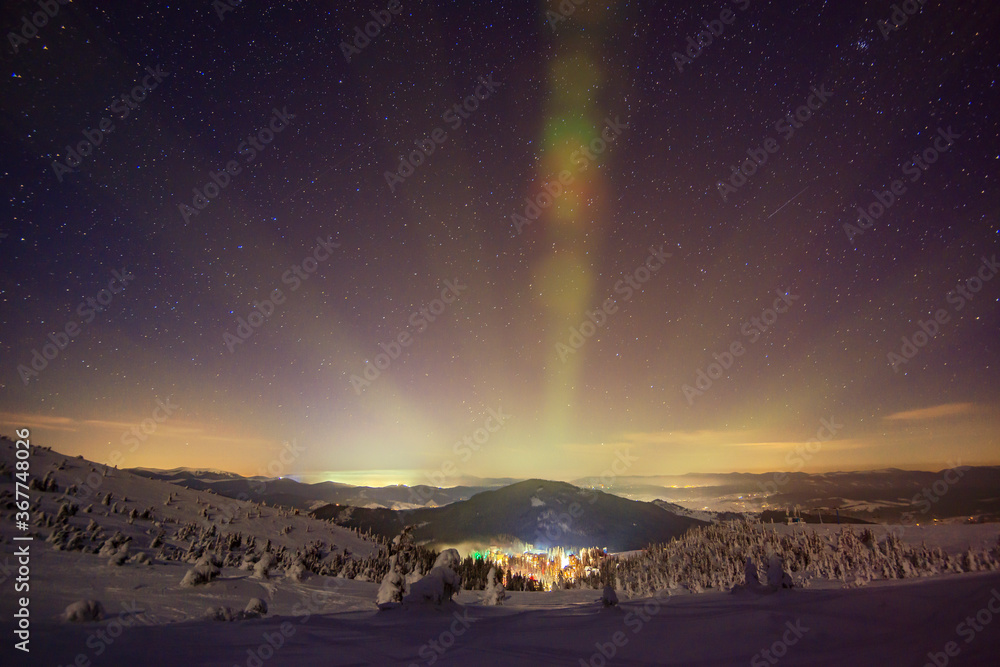 The resort ski resort illuminated at night