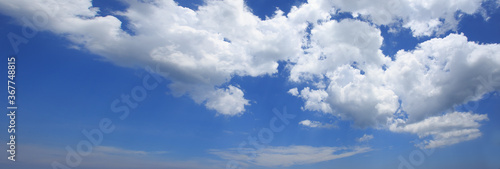 white clouds in the blue sky , panorama 