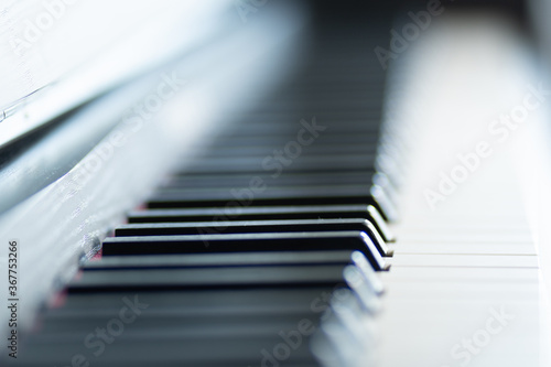 close up of piano keys black and white