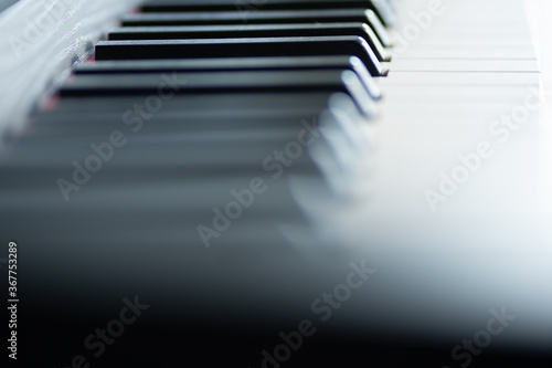 close up of piano keys black and white