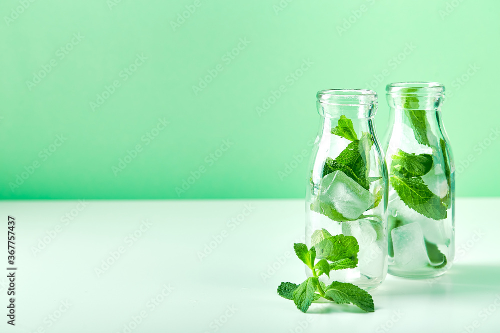 Fresh lemonade with mint in glasses Fresh lemonade with mint in glasses