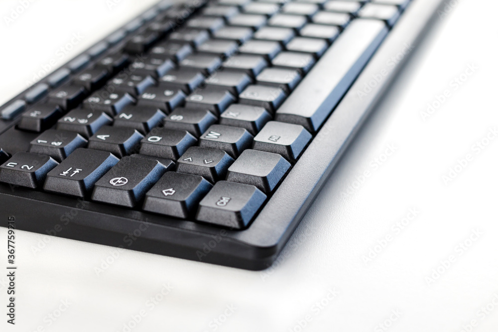 computer keyboard on white background, close-up, macro