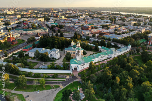 a panoramic view of the old fortress and church in the early morning at dawn filmed from a drone