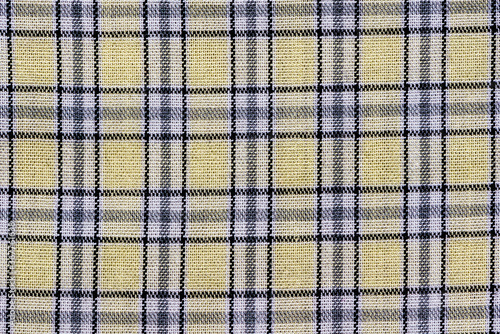 Plaid checkered cotton fabric texture background.