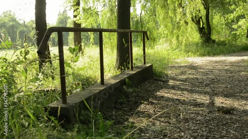 An old abandoned bridge. abandoned bridge in the park