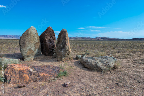 Ancient fireplace stones, Site of a 12th-century camp of Ghengis Khan and his troops, National Park Altyn-Emel, Almaty region, Kazakhstan, Central Asia photo