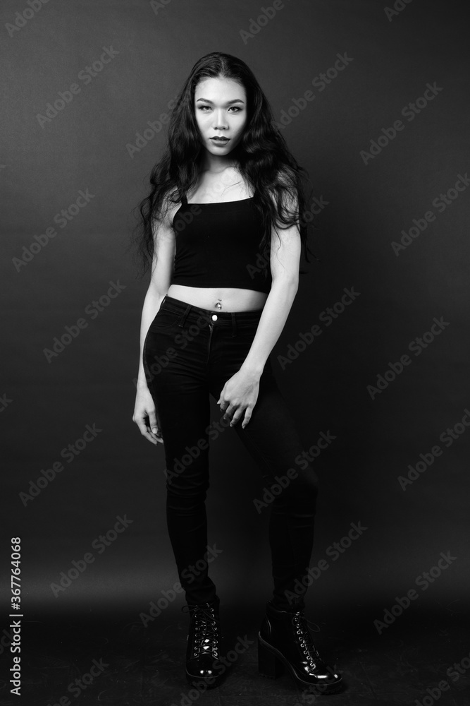 Young beautiful Asian transgender woman in black and white Young beautiful Asian transgender woman in black and white