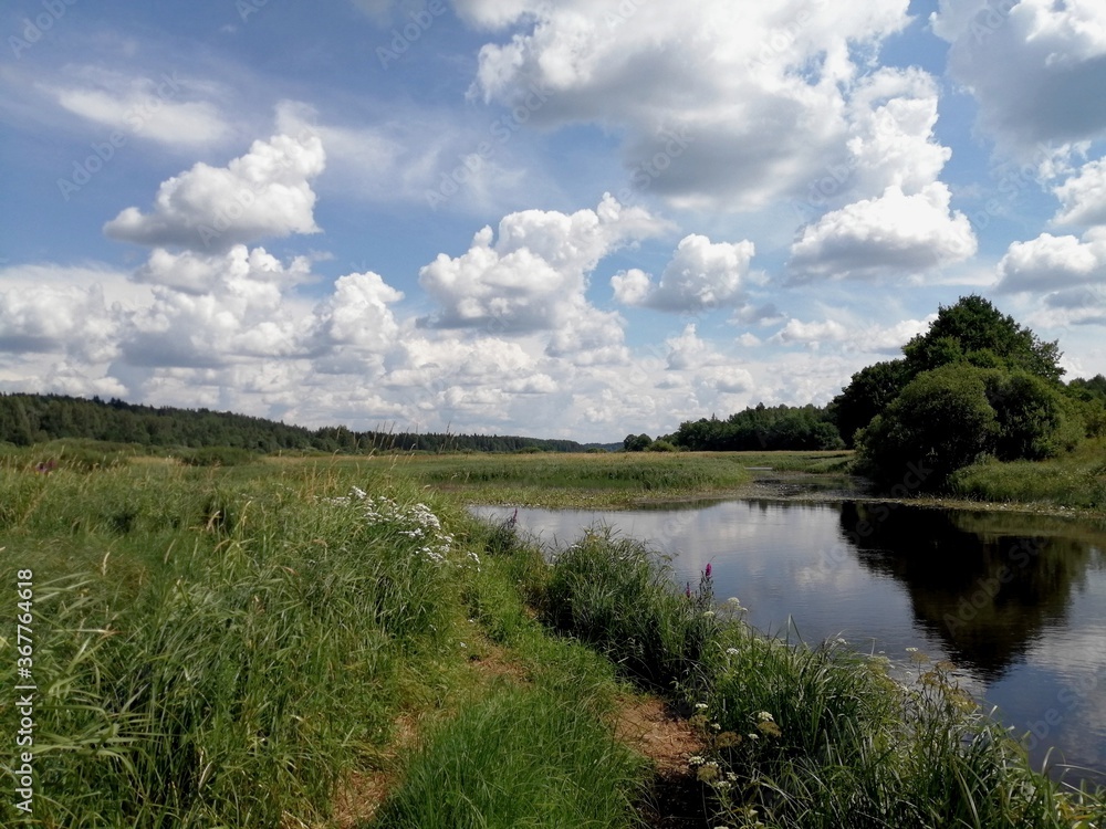 river, meadow and clouds