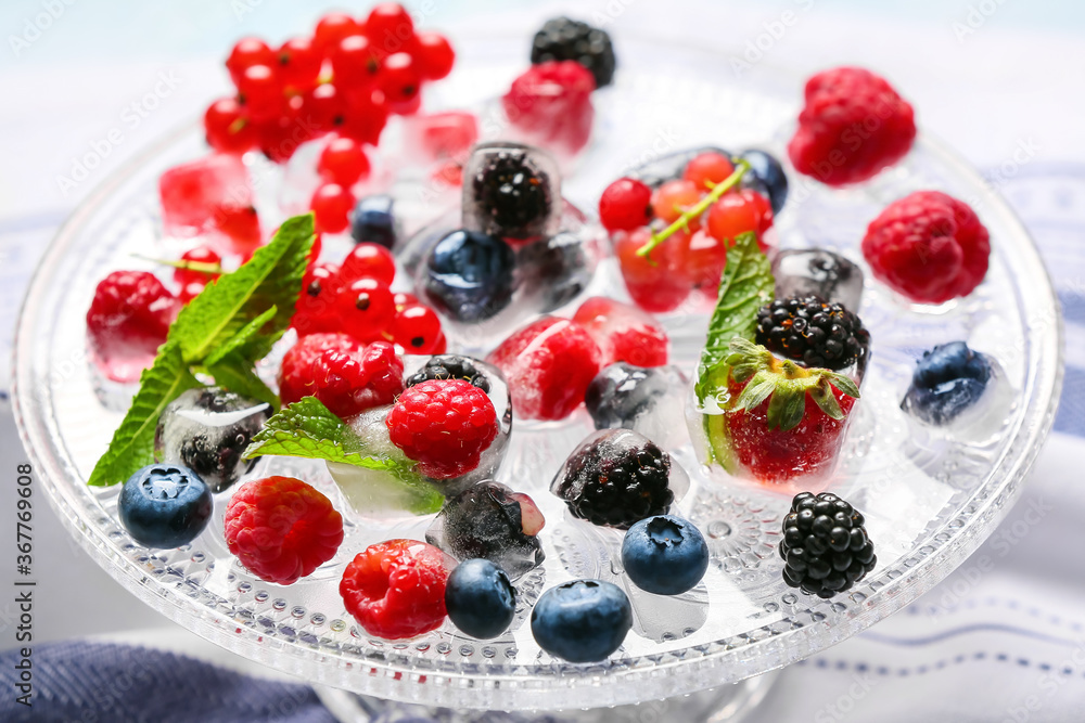 Ice with frozen berries on stand Ice with frozen berries on stand