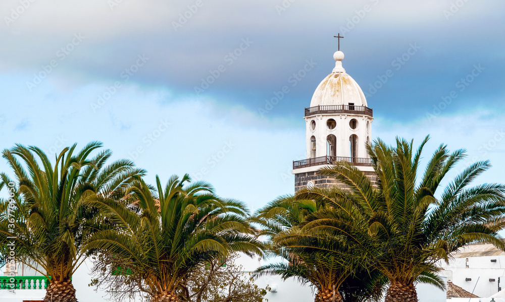 Teguise, Lanzarote, Canary Islands / Spain - March 8, 2011: Bell tower of the Church of Our Lady of Guadalupe