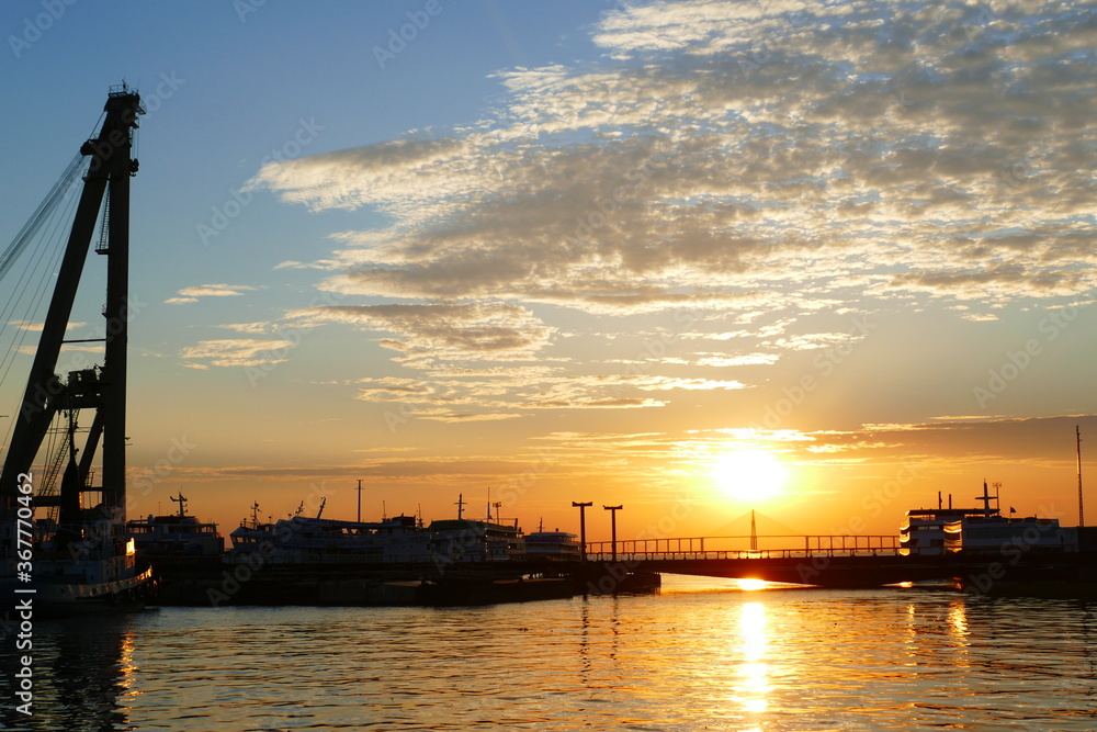 Impressive sunset over the Rio Negro river in Manaus, federal state Amazonas, Brazil. Impressive sunset over the Rio Negro river in Manaus, federal state Amazonas, Brazil.