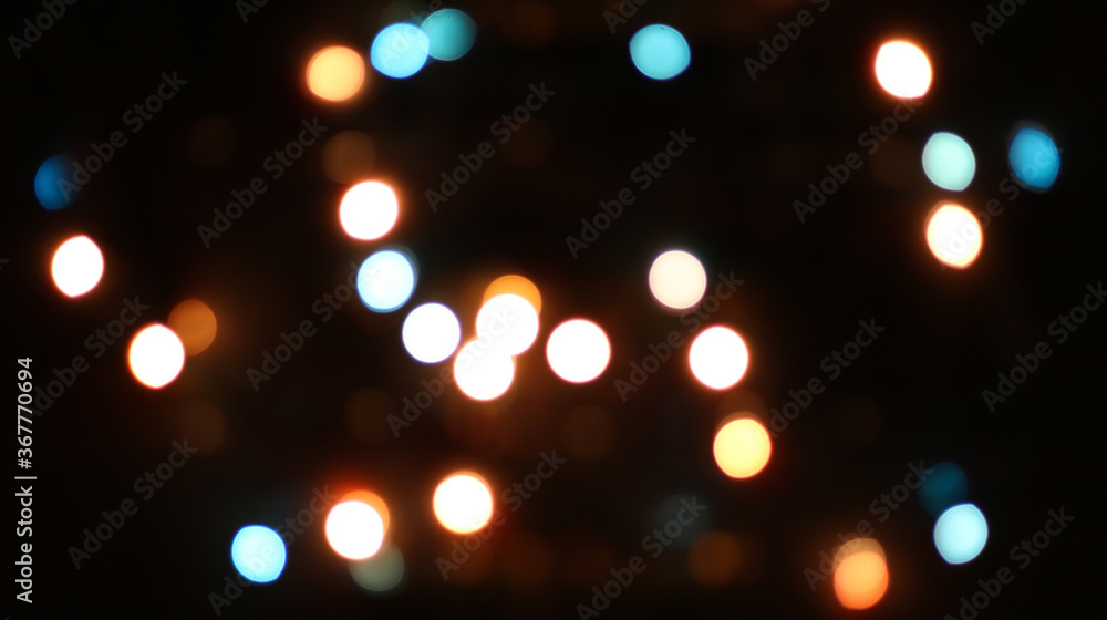Blurred bokeh in warm colors. Lights and highlights for the background. Blurred bokeh in warm colors. Lights and highlights for the background.