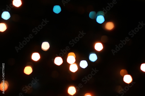 Blurred bokeh in warm colors. Lights and highlights for the background.