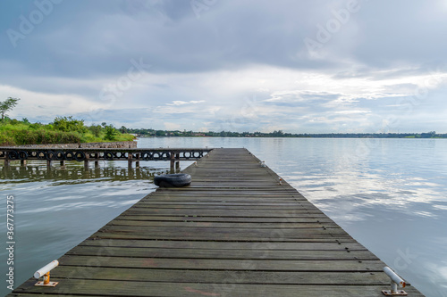 Wallpaper Mural Wooden pier on a lake scene, horizontal view with a beautiful rustic background Torontodigital.ca