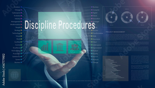 Businessman outreached hand holding a Discipline Procedures business concept on a computerised screen display. photo