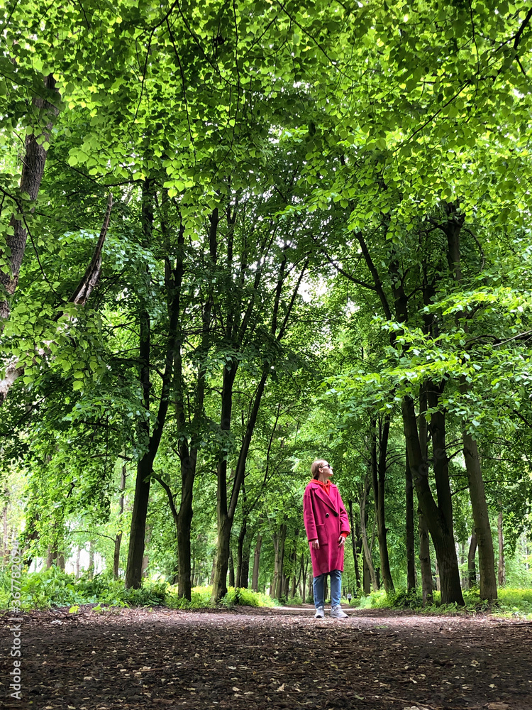 Young woman posing in the forest Young woman posing in the forest