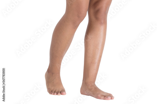 Fotografi Female feet walking on white background isolated