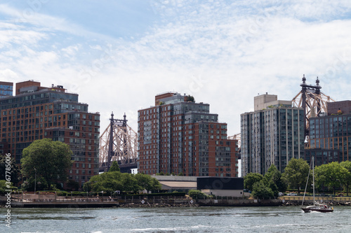 Roosevelt Island Skyline near the Queensboro Bridge along the East River in New York City during Summer