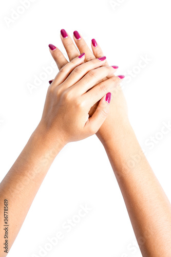 woman hands applying moisturizing cream to her skin on a white background