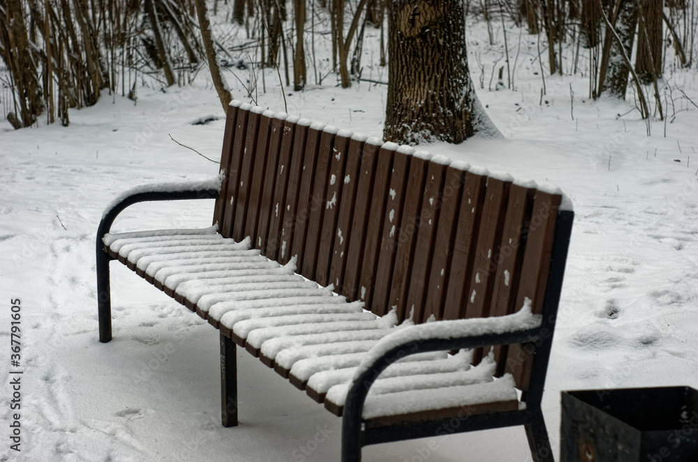 Park bench in the snow, Moscow