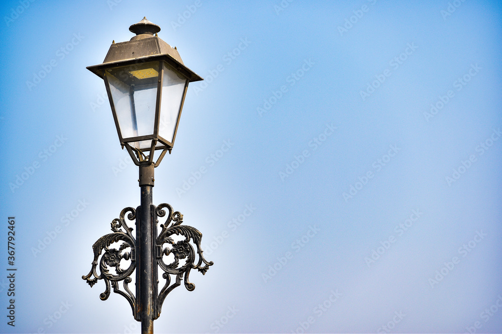 Bulb and retro lamp in the dark . Night Streetlight Background